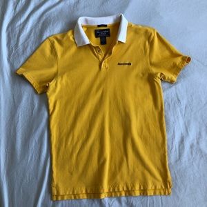 Yellow muscle polo with white collar